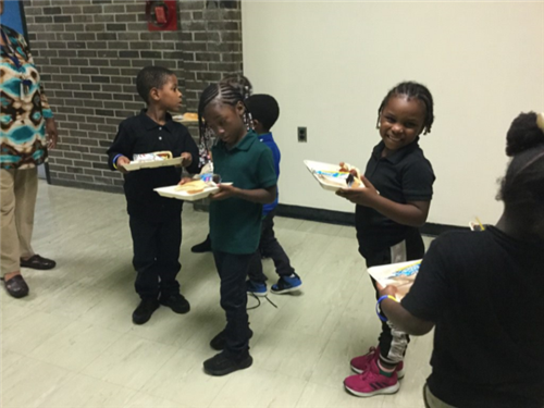 students getting barbeque 
